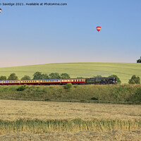 Buy canvas prints of Steam train v the hot air balloon  by Duncan Savidge