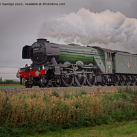 Buy canvas prints of Flying Scotsman steam train with black 5 moody clo by Duncan Savidge