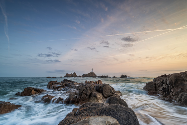 Corbiere Lighthouse. Canvas Print by Michael Tonge