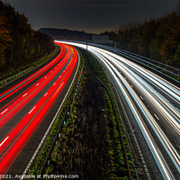 Buy canvas prints of Light Trails on the M25 by Adrian Rowley