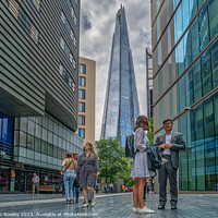 Buy canvas prints of Life in The City under The Shard by Adrian Rowley
