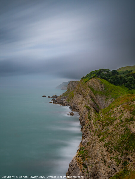 Jurassic Coast looking West from Lulworth Cove Picture Board by Adrian Rowley