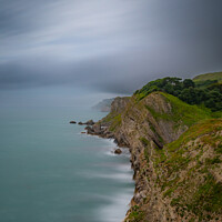 Buy canvas prints of Jurassic Coast looking West from Lulworth Cove by Adrian Rowley