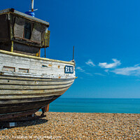 Buy canvas prints of Fishing boat at Hastings beach by Adrian Rowley