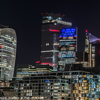 Buy canvas prints of The City of London at nightfall by Adrian Rowley