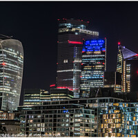 Buy canvas prints of The City of London Skyline at Night  by Adrian Rowley