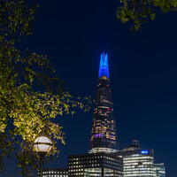 Buy canvas prints of Blue hour at The Shard by Adrian Rowley