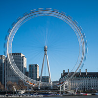 Buy canvas prints of The London Eye in motion by Adrian Rowley