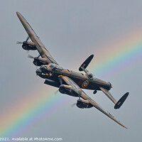 Buy canvas prints of Lancaster Bomber with Rainbow by Adrian Rowley