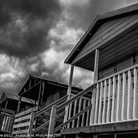 Buy canvas prints of Whitstable Beach Huts in Monochrome by Adrian Rowley