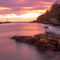 Buy canvas prints of Sunrise in Looe Harbour at the Banjo pier by Jim Peters