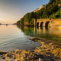 Buy canvas prints of Sunrise in Looe Harbour Cornwall by Jim Peters