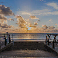 Buy canvas prints of Sunrise on Looe Beach Cornwall by Jim Peters