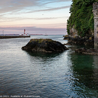 Buy canvas prints of Summers sunset in Looe Harbour entrance Cornwall by Jim Peters