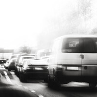 Buy canvas prints of Late Afternoon Traffic in City Crossing Monochrome by Taina Sohlman