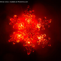 Buy canvas prints of Red Illuminated Christmas Light in Shape of Snowfl by Taina Sohlman