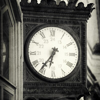 Buy canvas prints of Old Outdoor Wall Clock at Railway Station Monocrom by Taina Sohlman