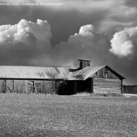 Buy canvas prints of Country Barn Under Cloudy Sky Monochrome by Taina Sohlman