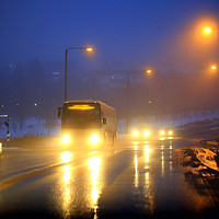 Buy canvas prints of Traffic on Foggy Blue Winter Evening by Taina Sohlman