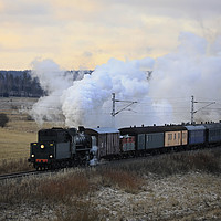Buy canvas prints of Vintage Steam Train Ukko-Pekka in Motion by Taina Sohlman