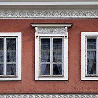 Buy canvas prints of Three Windows on Red City Buiding by Taina Sohlman