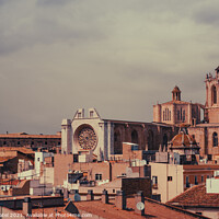 Buy canvas prints of Tarragona Cathedral rising above the rooftops of the old town by Mehul Patel