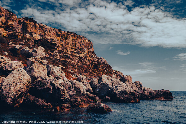 Rocky cliff face on south east coast of Menorca, Spain - Europe Picture Board by Mehul Patel
