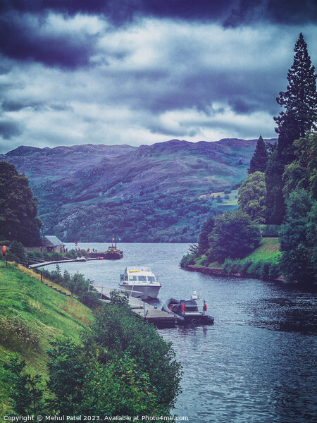 Touring boats moored on jetty on canal entering waters of Loch Ness Picture Board by Mehul Patel