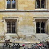 Buy canvas prints of Bicycles parked along the pavement in Cambridge by Mehul Patel