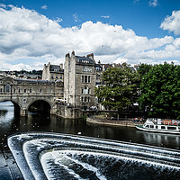 Buy canvas prints of Pulteney Weir on the river Avon by Pulteney Bridge by Mehul Patel