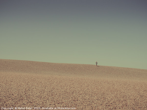 Person walking up Chesil beach, Dorset, England, U Picture Board by Mehul Patel