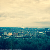 Buy canvas prints of View of the city of Montreal with the Olympic Stadium (centre) in the distance, Montreal, Canada - cross process effect by Mehul Patel