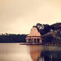 Buy canvas prints of Toned image of Hindu temple by volcanic crater lake of Grand Bassin, also known as 'Ganga Talao' or 'Ganges Lake', Mauritius, Africa by Mehul Patel