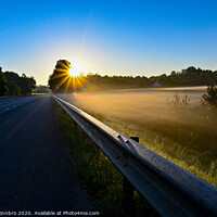 Buy canvas prints of early sunrise over straight road with deminishing perspctive by Jonas Rönnbro