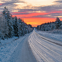 Buy canvas prints of winter road in Varmland Sweden and orange sunrise by Jonas Rönnbro
