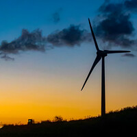 Buy canvas prints of Wind turbine at sunset by Brenda Belcher