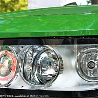 Buy canvas prints of headlight on the front  of John Deere tractor by M. J. Photography