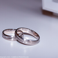 Buy canvas prints of wedding rings isolated on white by M. J. Photography