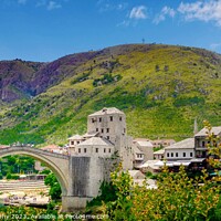 Buy canvas prints of A bridge over a river in Mostar by M. J. Photography