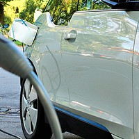 Buy canvas prints of Power supply for electric car charging. Electric c by M. J. Photography
