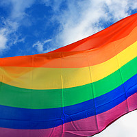 Buy canvas prints of Rainbow flag (LGBT movement) on the sky background by M. J. Photography