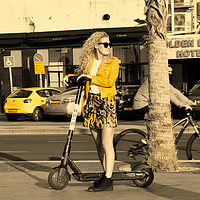 Buy canvas prints of BLonde girl drive scooter by M. J. Photography