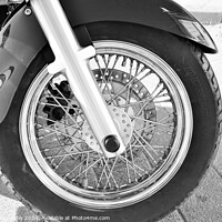 Buy canvas prints of A motorcycle parked on the side of a road by M. J. Photography