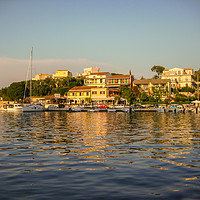 Buy canvas prints of Kassiopi, Corfu, Greece - Beautiful sunset of boat by Florin Brezeanu