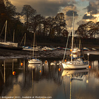 Buy canvas prints of Boats moored at Caernarfon by Christian Bridgwater