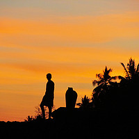 Buy canvas prints of Silhouetted boy on Kenyan cliff by Rehanna Neky