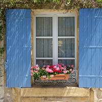 Buy canvas prints of Window with blue shutters and window box of flowers by Rocklights 