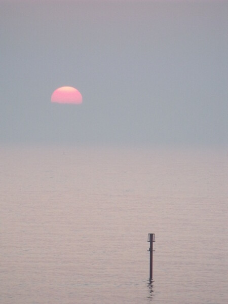 Sunrise at Newbiggin by the Sea Picture Board by Richard Dixon