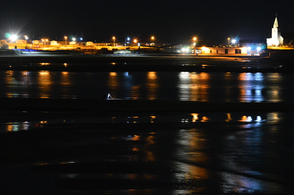 Night fishing in the bay at Newbiggin-by-the-Sea  Picture Board by Richard Dixon