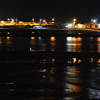 Buy canvas prints of Night fishing in the bay at Newbiggin-by-the-Sea  by Richard Dixon